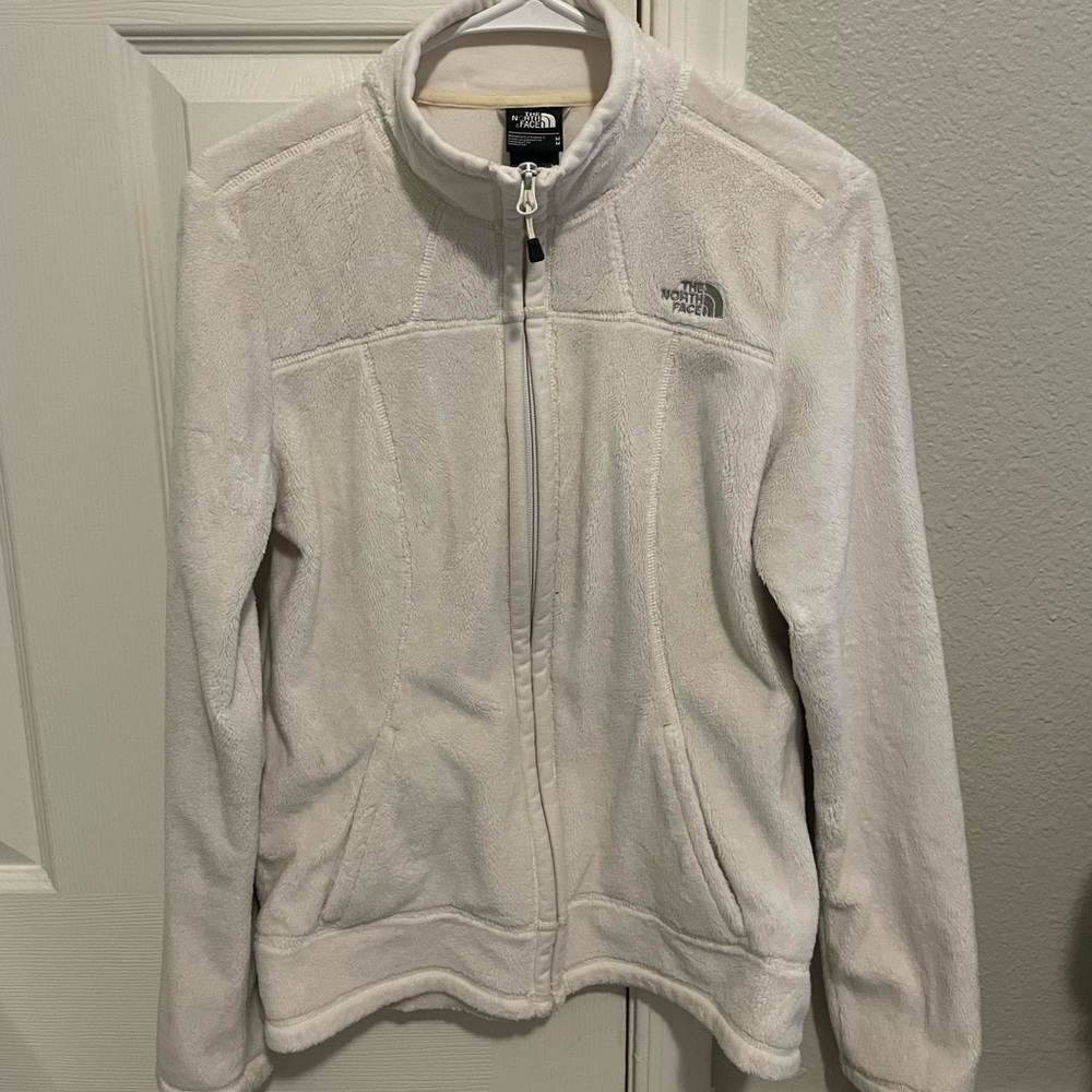 Cream colored The North Face women’s size M fleece jacket